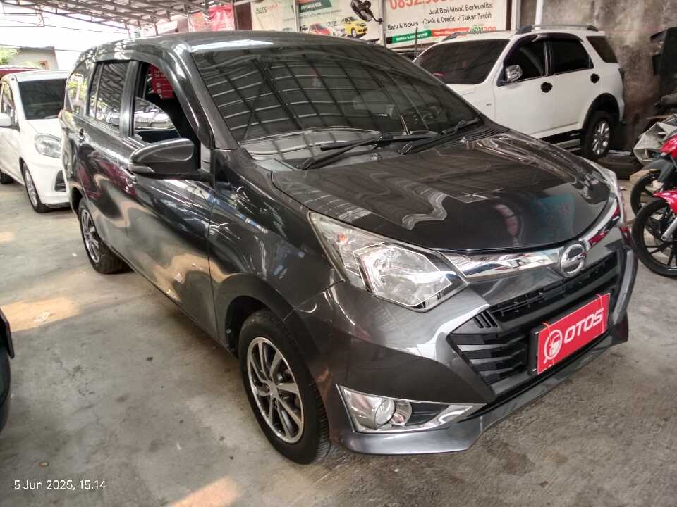 2016 Daihatsu Sigra 1.2 R - Foto 1 dari 6