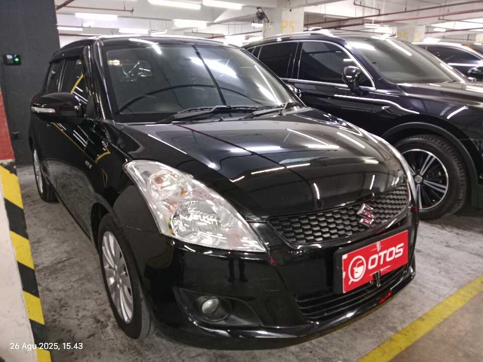 2016 Suzuki Swift 1.4 GL - Foto 1 dari 6
