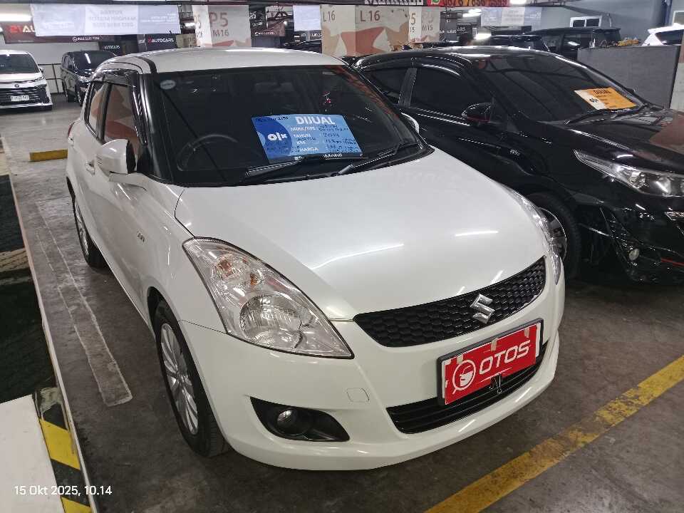 2014 Suzuki Swift 1.4 GX - Foto 1 dari 10