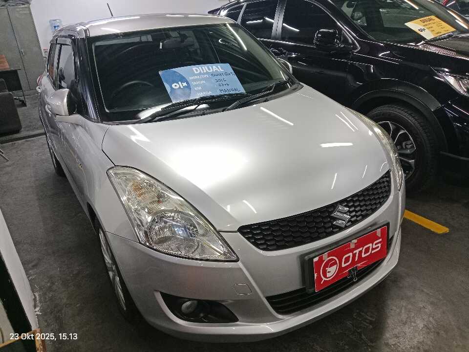 2016 Suzuki Swift 1.4 GX - Foto 1 dari 6