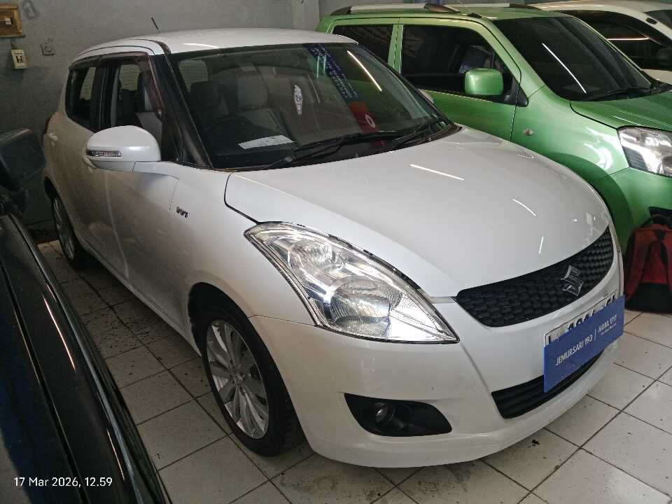2014 Suzuki Swift 1.4 GX - Foto 1 dari 6