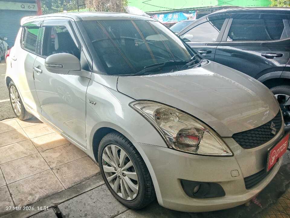 2014 Suzuki Swift 1.4 GX - Foto 1 dari 6