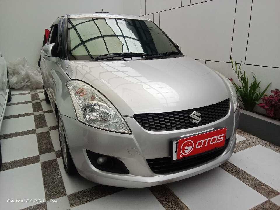 2016 Suzuki Swift 1.4 GX - Foto 1 dari 6